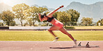 Sprinting, sports and woman training at a stadium for fitness, exercise and cardio with energy. Running, speed and athlete runner moving with power, fast and action for a race or competition