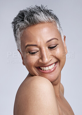 Buy stock photo Face, beauty and skincare with a senior woman in studio on a gray background for wellness or natural care. Health, cosmetics and antiaging with a mature female posing for dermatology or cosmetology