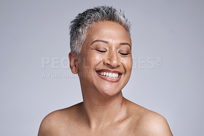 Buy stock photo Happy senior model, beauty and makeup face for cosmetics, health and skincare by studio backdrop. Elderly black woman, skin wellness and radiant cosmetic glow, anti aging and smile by grey background