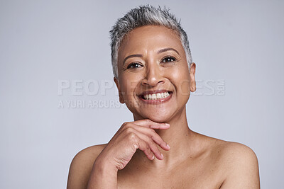 Buy stock photo Skincare, beauty and portrait of a senior woman with a natural, organic and cosmetic face routine. Happy, smile and elderly lady with a facial skin treatment isolated by a gray background in a studio