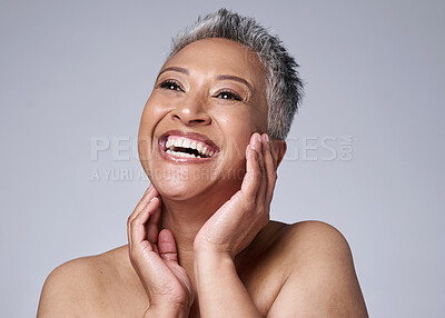 Buy stock photo Face, beauty and skincare with a senior woman in studio on a gray background happy with an antiaging treatment. Wellness, cosmetics and skin with a mature female inside to promote natural facial care