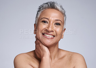 Buy stock photo Senior, beauty and portrait of natural woman with mature skin for dermatology cosmetic advertising. Skincare, wellness and happy face of model for antiaging marketing with mockup in white studio.

