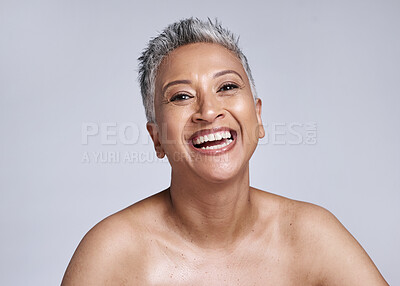 Buy stock photo Skincare, glow and senior woman in a studio portrait happy with facial cosmetics, healthy skin and natural makeup for retirement wellness. Smile face of an elderly or old woman model for dermatology 