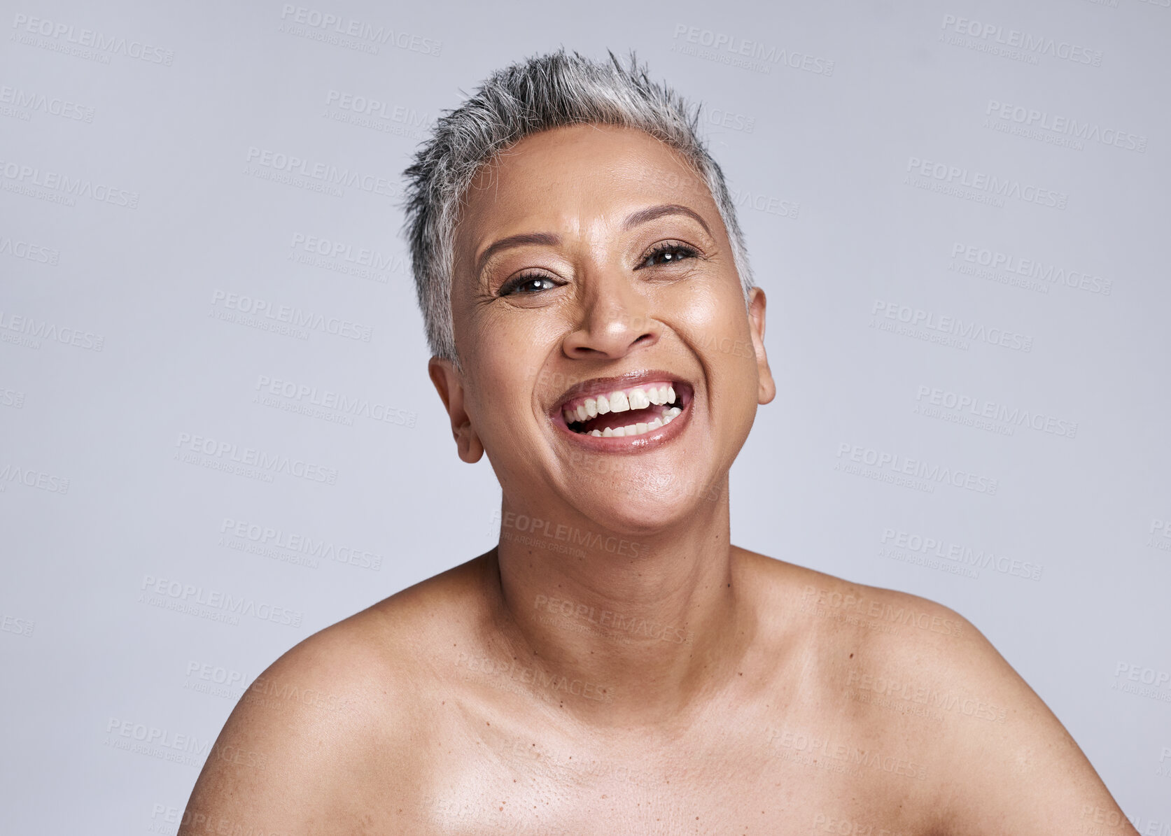 Buy stock photo Skincare, glow and senior woman in a studio portrait happy with facial cosmetics, healthy skin and natural makeup for retirement wellness. Smile face of an elderly or old woman model for dermatology 