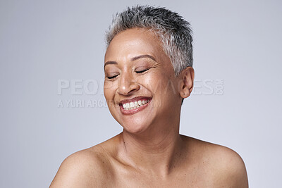 Buy stock photo Happy senior woman, studio and beauty with eyes closed, skincare and cosmetics with smile, glow and face. Elderly model, skin and facial for wellness, health and self care by cosmetic background