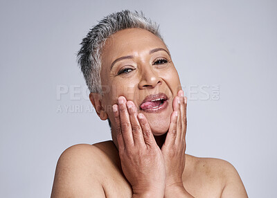 Buy stock photo Beauty, senior and comic portrait of woman for cosmetic wellness, health and antiaging marketing. Funny, crazy and excited face of mature skincare model with tongue out for white studio mockup.

