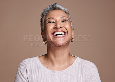 Buy stock photo Black woman, beauty and happiness with a senior laughing about funny joke or memory on a brown studio background. Face portrait of a mature model posing for cosmetics, makeup or fashion mockup