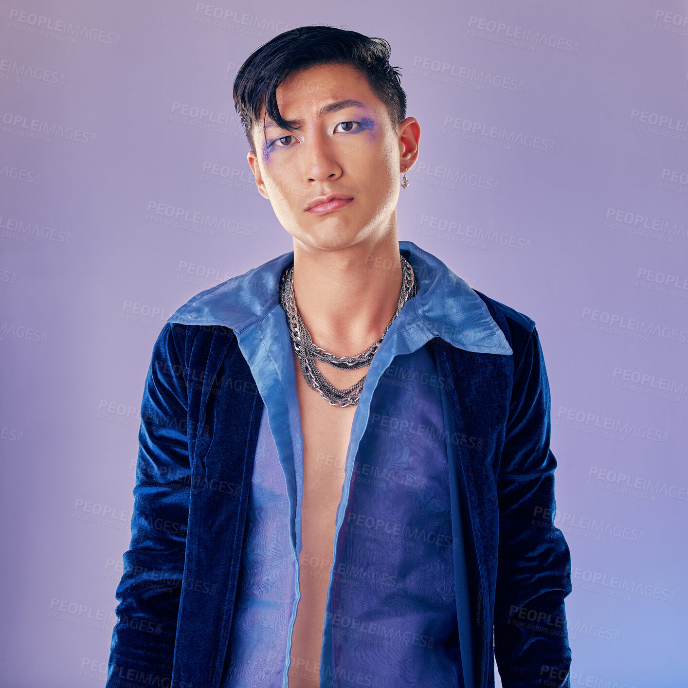 Buy stock photo Asian man, makeup and punk fashion for portrait in studio with cyberpunk, creative or aesthetic face. Futuristic model, metal jewellery or clothes with art, cosmetic or beauty by lavender background