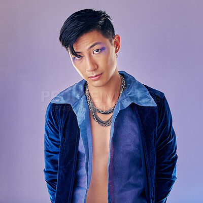 Buy stock photo Cyberpunk, makeup and Asian man with fashion for rock, metal identity and futuristic clothes. Freedom, cosmetics and portrait of a young creative rock model with luxury clothing and funky, cool style
