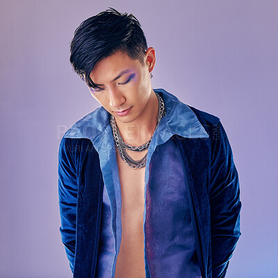 Buy stock photo Asian man, fashion and cyberpunk makeup aesthetic for futuristic beauty or vintage clothes. Retro, creative pop art gen z model and funky rock style with metal chain in purple background studio 