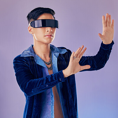 Buy stock photo Vr, futuristic and man in metaverse in studio isolated on a purple background. 3d, virtual reality glasses and male exploring virtual world, app or ai games, digital software or future cyber space
 
