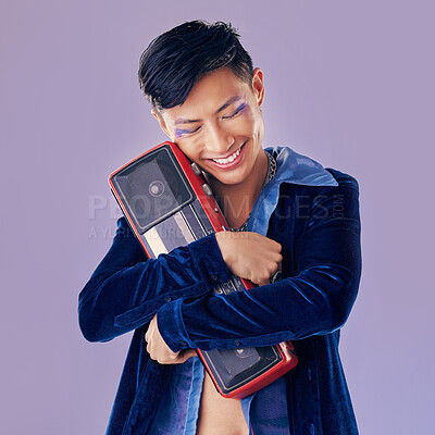 Buy stock photo Retro, disco and boom box with asian man and punk makeup for music, creative and festival event. Art, dj and techno with guy and stereo speaker for vintage, cosmetics and rock in purple background