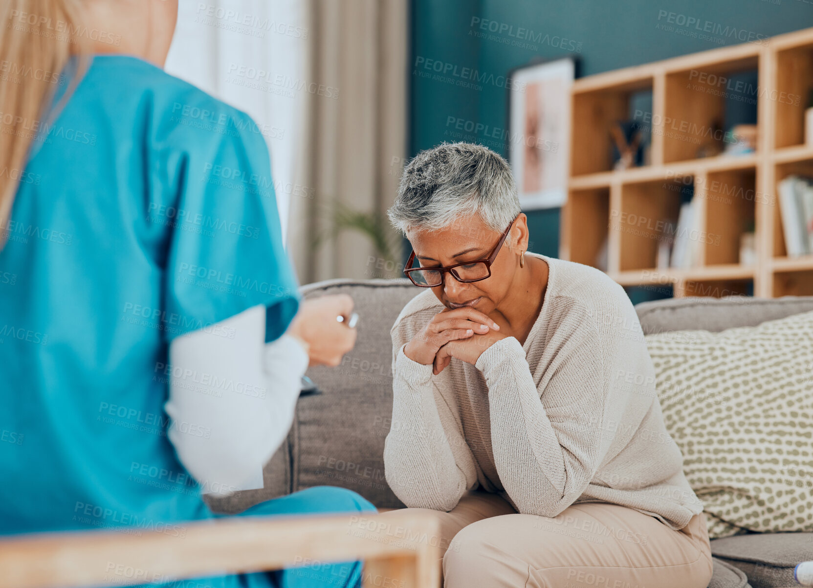 Buy stock photo Talking, healthcare and nurse with sad old woman in home, sitting on sofa and upset after cancer news. Medical care, sickness and senior female with doctor depressed, anxious and worried about health