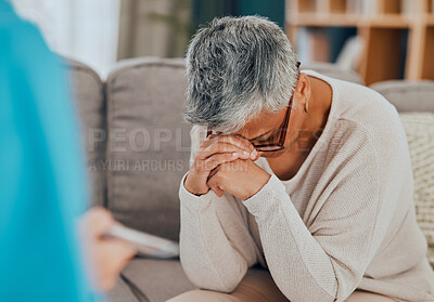 Senior woman, support and mental health on sofa in therapy or counseling help for depression, anxiety and healthcare. Psychologist appointment, sad female on couch or consulting in psychology office