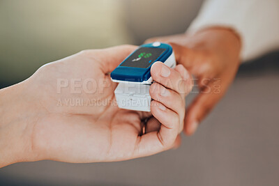 Buy stock photo Oximeter, test and hand of a doctor with a patient for healthcare, medical help and consulting in house. Digital, monitor and reading of health of oxygen in blood and check during a consultation