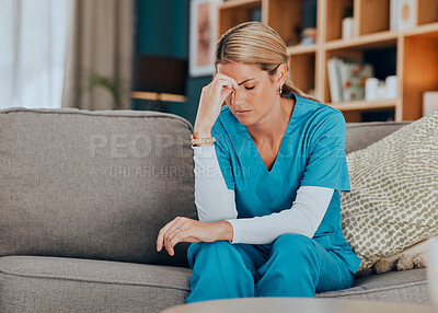 Buy stock photo Worry, stress and burnout woman nurse sitting on sofa of modern apartment home sad with depression from work. Hand on head, anxiety and tired nursing in mental health distress on couch of living room