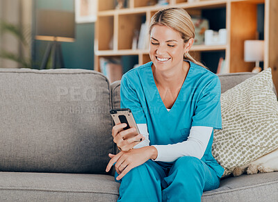 Buy stock photo Nurse, phone and happy with social media, post or funny meme on sofa in home. Woman with healthcare, medical and wellness app on mobile technology or search internet, reading news and text contact