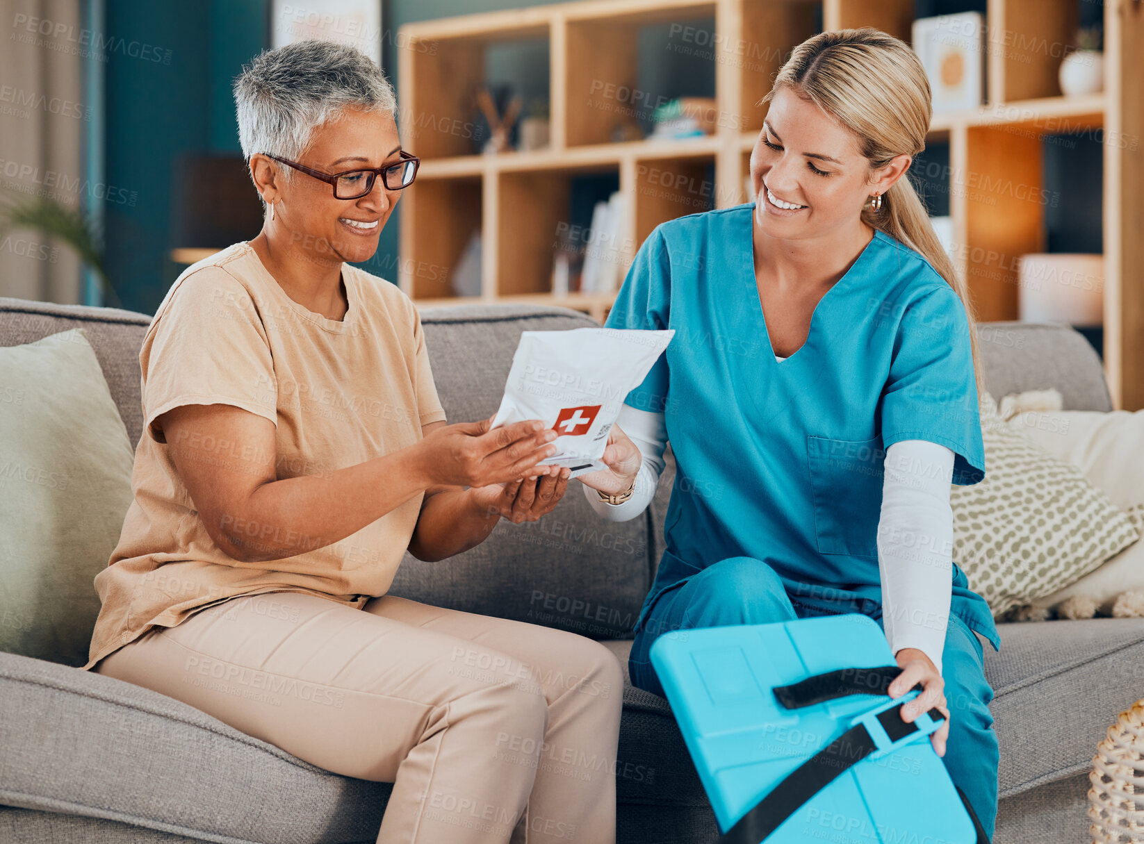 Buy stock photo Healthcare, home visit and woman with doctor on sofa or doctors visit in house living room. Senior care, nurse or caregiver with patient, trust and support in medical advice or medicine delivery.