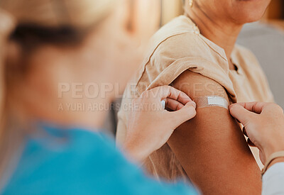 Buy stock photo Healthcare, patient and plaster on arm for covid vaccine, flu shot or arthritis or osteoarthritis injection in hospital for health and wellness. Woman and nurse or doctor together during consultation