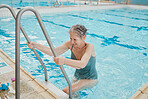 Relax, summer and health with old woman in swimming pool for training, cardio and exercise. Wellness, retirement and happy with senior citizen leaving water after workout, fitness and aquatic therapy
