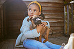 Girl child, animal shelter and dog hug, love and care while thinking about adoption. Pet, charity and kid hugging, embrace or cuddle with foster puppy, bonding and contemplating support for animal.
