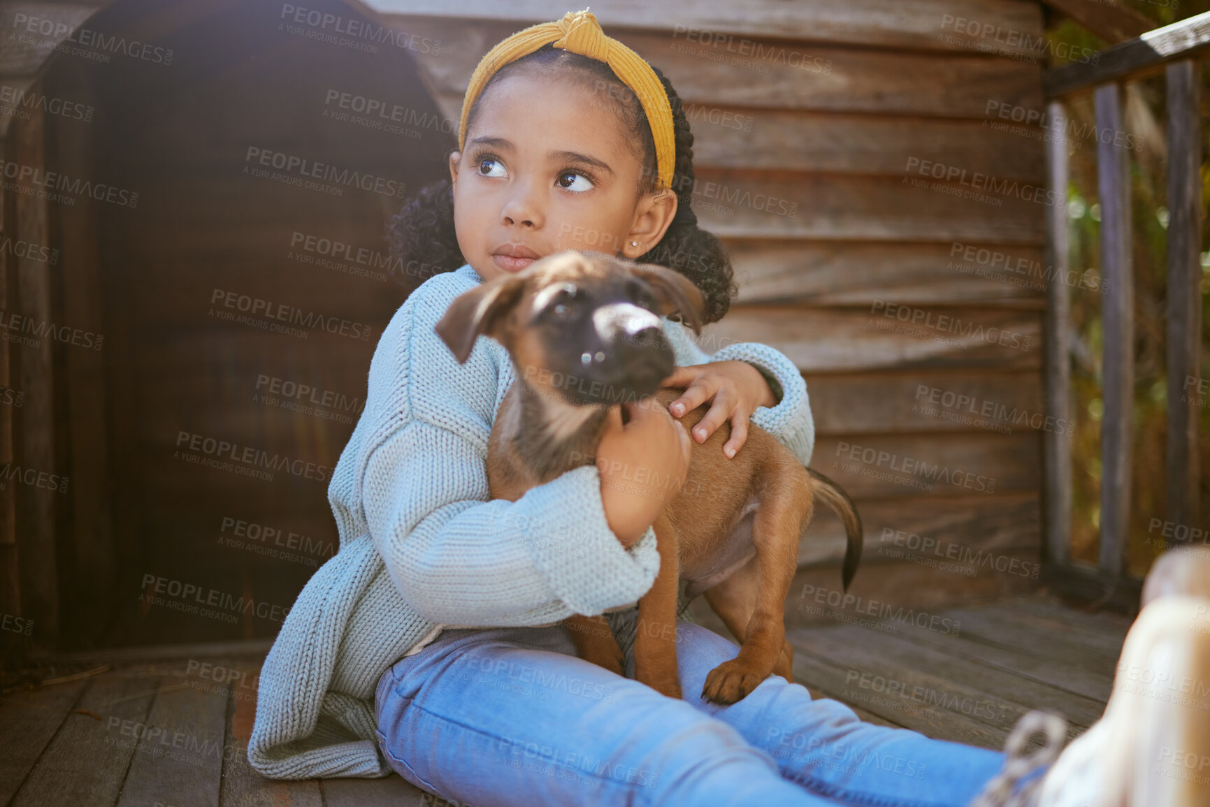 Buy stock photo Girl child, animal shelter and dog hug, love and care while thinking about adoption. Pet, charity and kid hugging, embrace or cuddle with foster puppy, bonding and contemplating support for animal.
