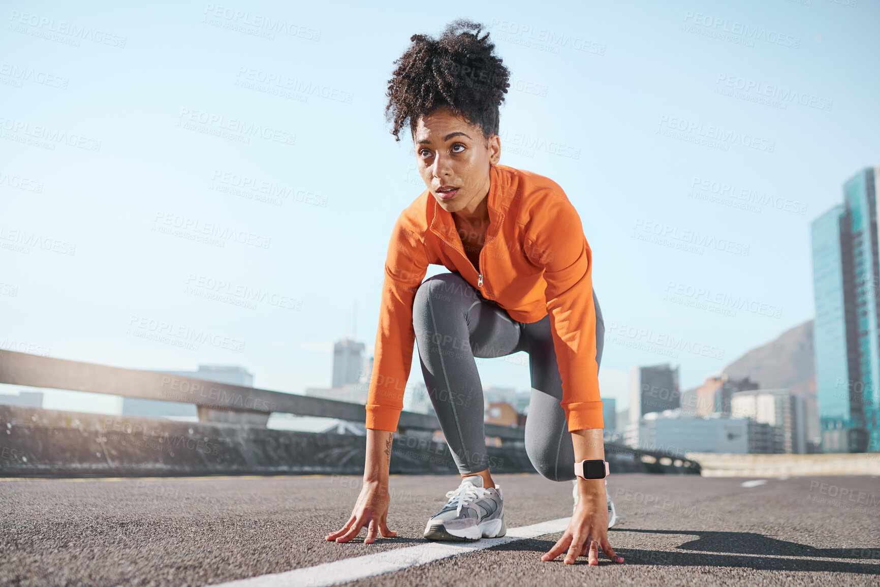 Buy stock photo Runner, black woman and street for race, start or sprint in exercise, workout and training in city. Woman, focus and running for fitness, sport and health on road, metro or urban town in sunshine