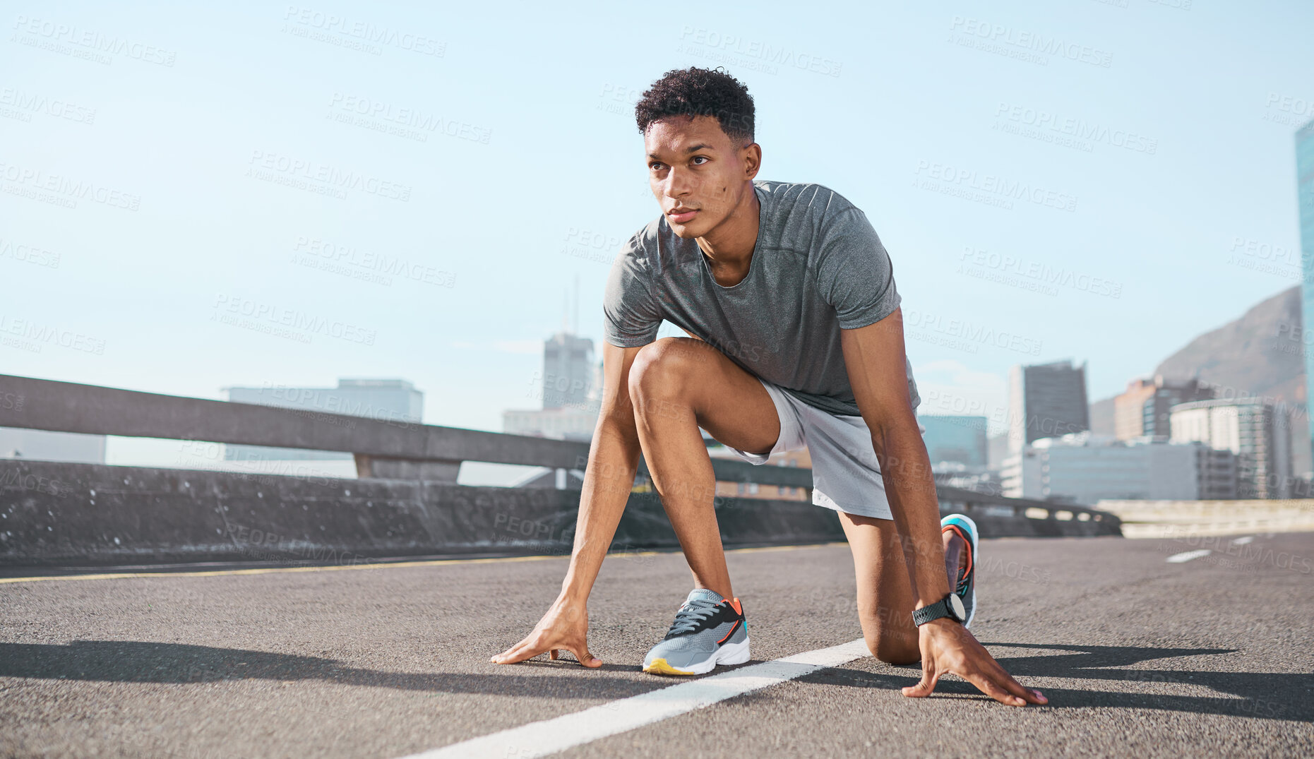 Buy stock photo Black man, city runner and start running training on road, outdoor cardio exercise and sprinting practice marathon workout run. Sprint athlete exercising, town street and ready to start summer race 

