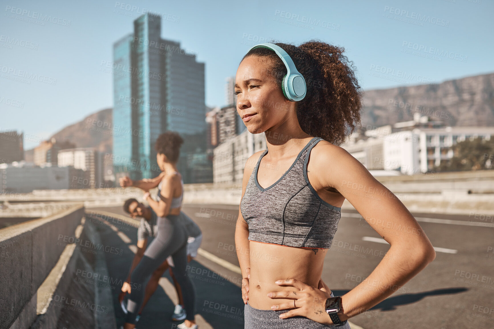 Buy stock photo Music, fitness and black woman in city for running, exercise and sports, training and with friends outdoor. Podcast, runner and girl relax at workout on highway, listen to wellness, audio and mindset