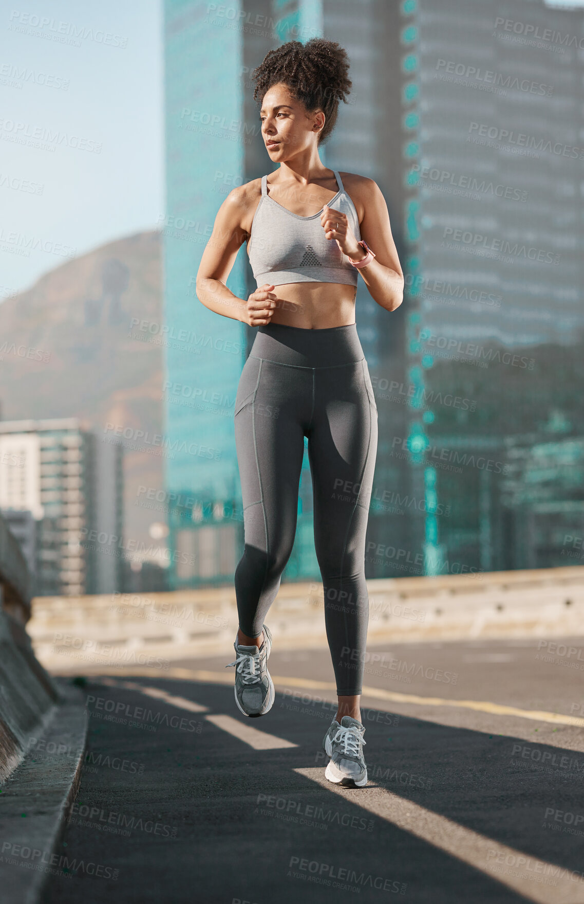 Buy stock photo Fitness, exercise and black woman running in city for health, wellness and training. Motivation, endurance and female athlete run on road or street of urban town for workout, sports and marathon