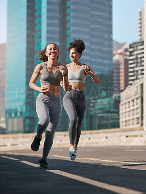 Buy stock photo Fitness, woman and friends running in the city for cardio exercise, training or workout together in the outdoors. Happy active women enjoying a run for a healthy balanced lifestyle in Cape Town