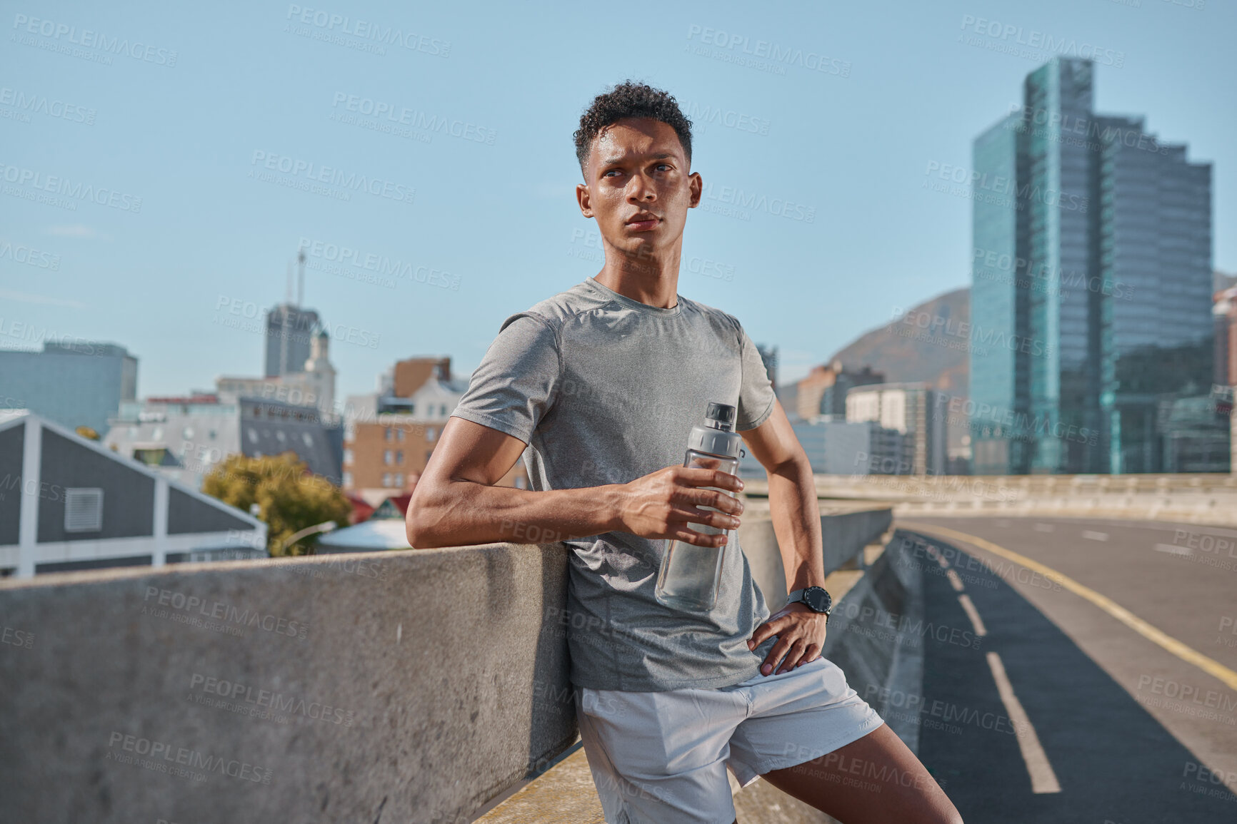 Buy stock photo Runner, fitness and water with a sports man taking a break from his workout or training in the city. Wellness, running and health with a male athlete resting during cardio or endurance exercise