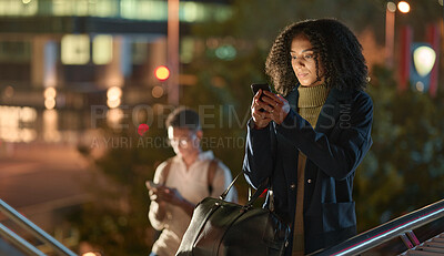Buy stock photo Black woman, phone and social media in the night city for communication, chatting or texting in the outdoors. African American female in social networking on mobile 5G smartphone in the urban city