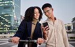 Couple, friends or students in city with phone for communication, networking or social media at night. Electric scooter, happy or black woman and man on smartphone for 5g network, contact us or app