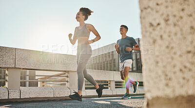 Buy stock photo Fitness, couple and running workout in city, urban town and sunshine for exercise, healthy lifestyle and wellness. Young man, woman and runner partner with motivation of cardio, marathon and training