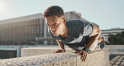 Buy stock photo Exercise, black man and push ups outdoor at workout, fitness and focus for wellness, health and training. Motivation, young male and athlete in city, healthy and practice in sportswear and strong