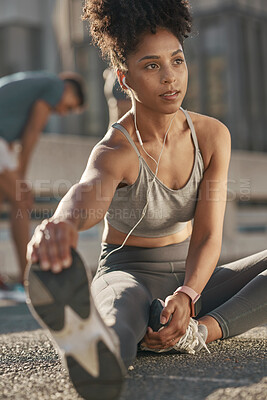 Buy stock photo Black woman, stretching legs and streaming audio yoga fitness podcast before run. Cardio training, healthy lifestyle and listening to music for motivation, peace and relax in workout on city street