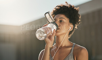 Buy stock photo Fitness, drinking water and black woman listening to music for workout motivation, wellness and healthy lifestyle in morning city. Sports, runner girl outdoor with water bottle and exercise audio