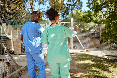 Buy stock photo Veterinary, volunteer and medical team together outdoor for planning, strategy and discussion about schedule and healthcare at animal shelter. Veterinarian man and woman doctor talking animals at vet