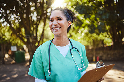 Buy stock photo Woman, nurse and smile with clipboard in the park for healthcare, medical or consultation and assistance. Happy female doctor or veterinary in nursing check, inspection or prescription advice outside