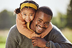 Father, child and hug in portrait smile for piggyback fun, trip or family time together in the outdoors. Dad with hugging kid smiling in happiness for bonding weekend, break or vacation in nature