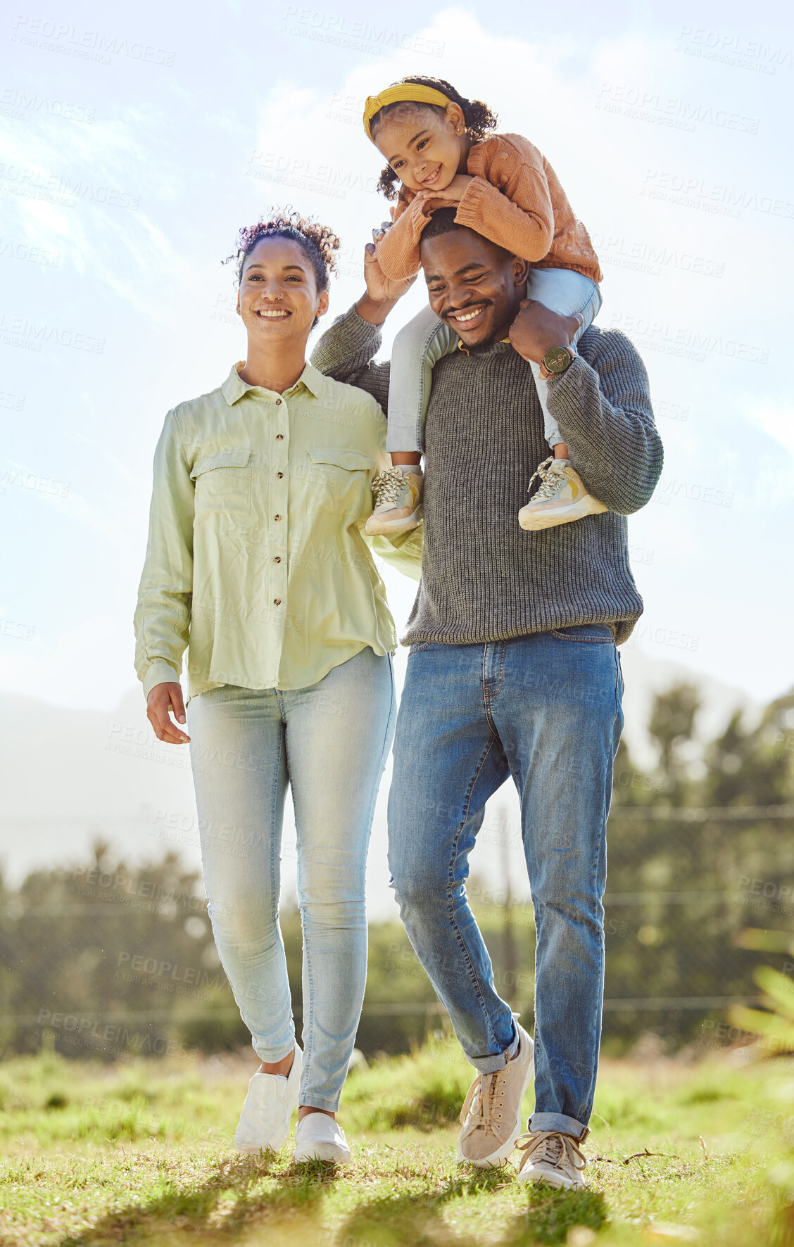 Buy stock photo Black family, dad carry girl and outdoor for quality time, happy and smile together outdoor. Parents, mom and dad with daughter walking, bonding and being loving for happiness, on break and for fun.