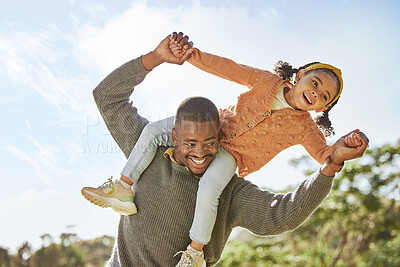 Buy stock photo Dad, child and piggyback for family, fun and quality time together playing with a smile at the park outdoors. Happy father carrying kid on shoulders smiling in joyful happiness for bonding in nature