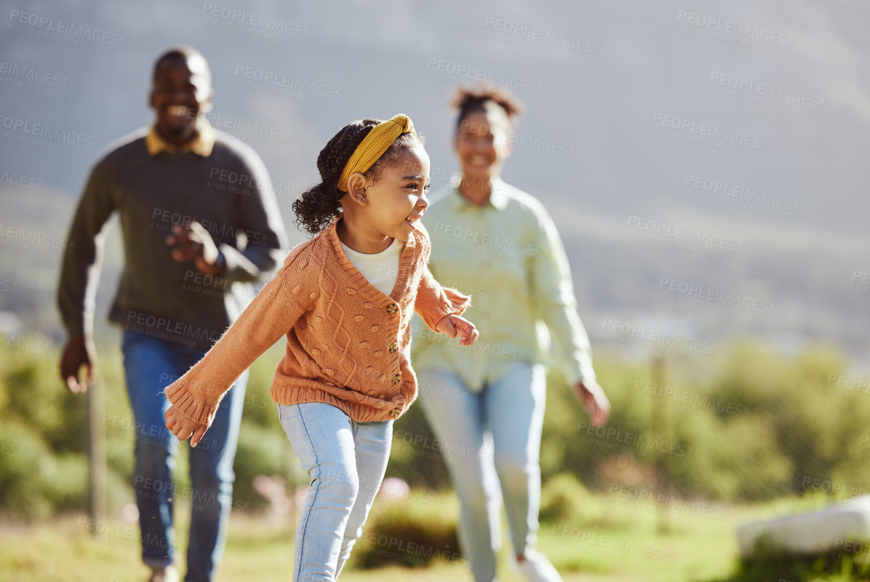 Buy stock photo Black family, fun child and parents running, chasing and enjoy bonding quality time with youth kid on countryside vacation. Love, peace and freedom for happy girl, father and mother playing outdoor