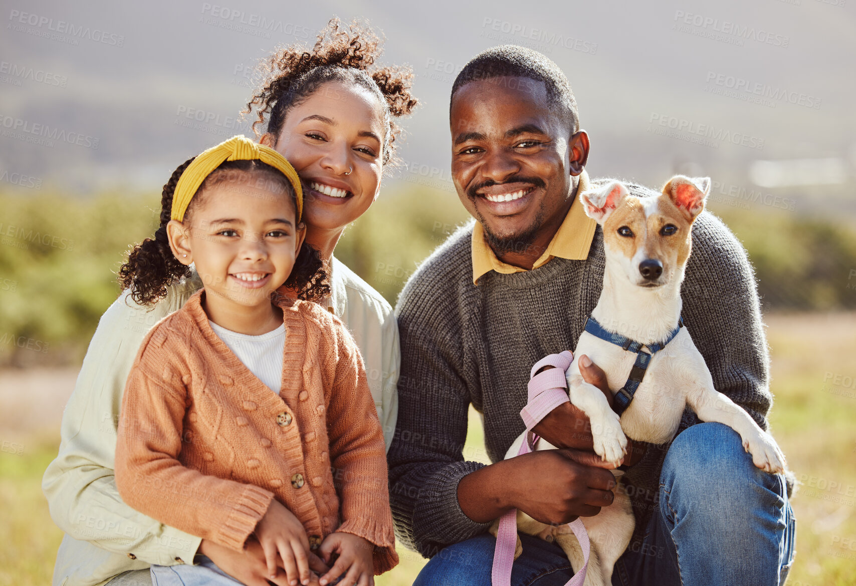 Buy stock photo Happy family, dog and portrait and a park, relax and smile while bonding in nature, calm and cheerful. Happy, black family and love with girl, pet and parents enjoying quality time in a forest