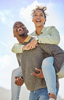 Buy stock photo Piggyback, laugh and and love with a black couple having fun together outdoor during a summer day. Dating, romance and carefree with a man carrying a woman on his back outside on holiday or vacation