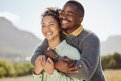 Buy stock photo Black couple, hug and smile for countryside travel, trip or quality bonding time together in the outdoors. Man and woman hugging embracing relationship and enjoying vacation, traveling and nature