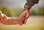 Family, hands and girl with father closeup in a park, holding hands and walking in nature, bond and relax outdoors. Love, trust and parent hands with child in support of trust, peace and unity 