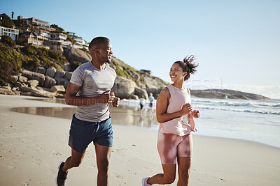 Buy stock photo Couple, fitness and running with smile at the beach, exercise and cardio, happiness and active lifestyle. Young, happy people, runner and health, body training and motivation workout outdoor at ocean
