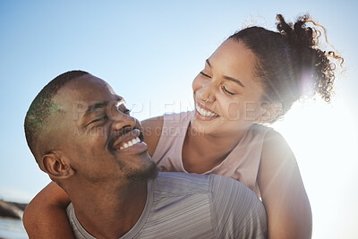 Buy stock photo Love, couple and happy together on travel vacation or holiday in summer on beach. Black woman, happy man smile and carry wife on back for fun, bonding adventure or  activity in nature outdoors